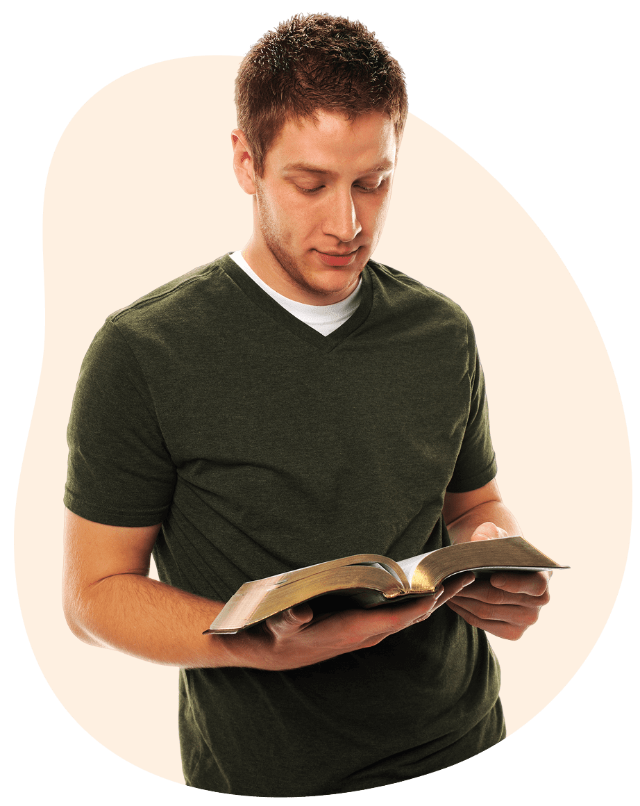 Man reading a book intently.